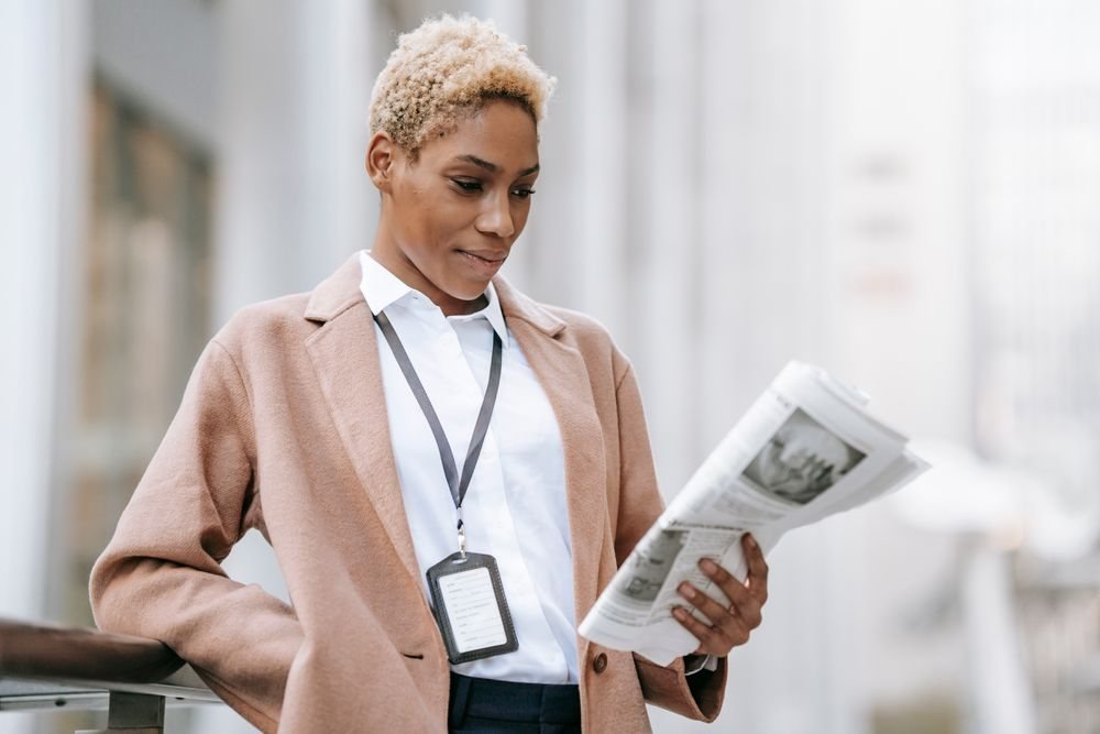 Portrait of a corporate lead in a camel blazer