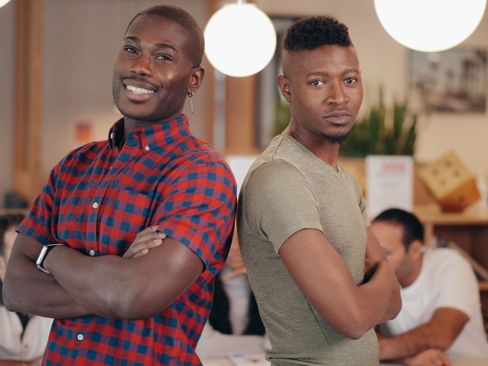 Two co-founders standing together